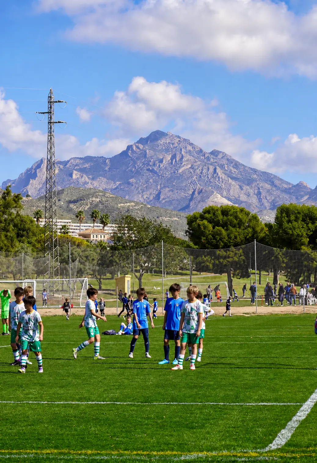 Junior players regrouping on the training pitch