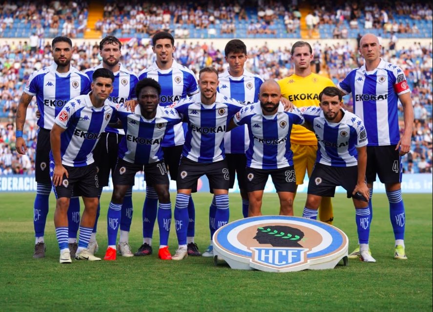 The Hercules CF first team in their blue and white striped kits