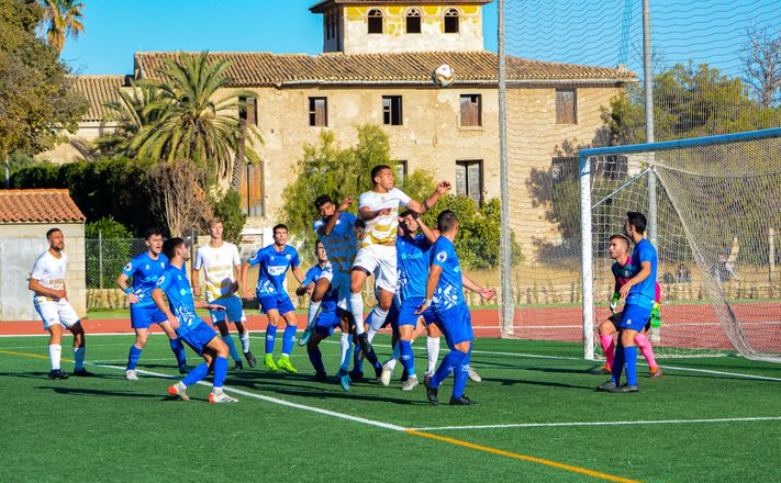 Players competing for a header during a match