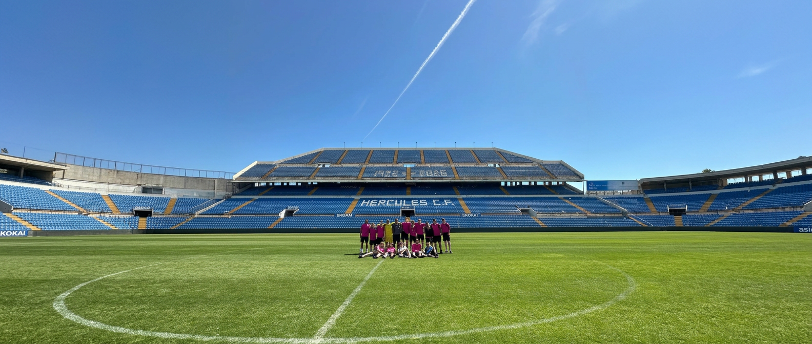Squad group photo on the pitch at the Estadio José Rico Pérez