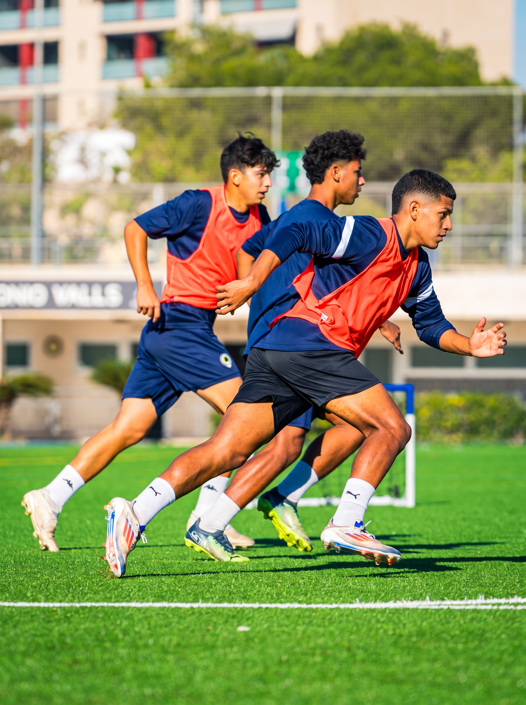 Players sprinting during a training session